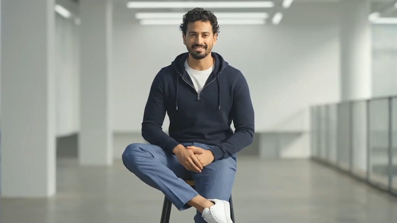 Jalal Shams seated in a bright modern interior